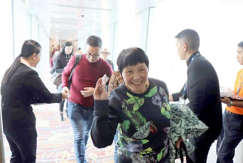 Chinese visitors arrived at Yangon International Airport. 
