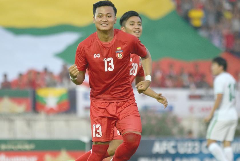 Ye Min Thu who is wearing No 13 jersey celebrates after scoring against Macao in Asian U-23 qualifier. 
