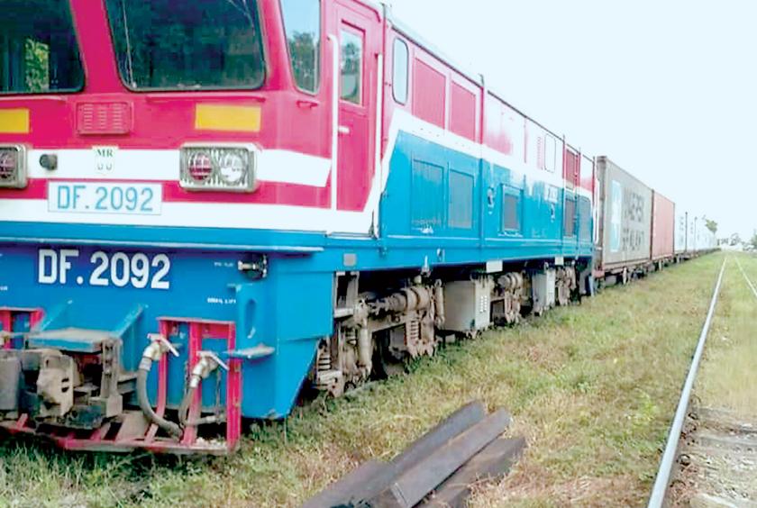A container train car runs to Yayni railway station in Bago from the MITT port.