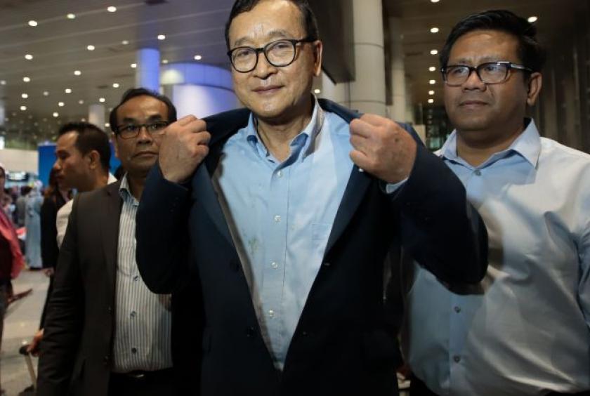 Sam Rainsy arrives at Kuala Lumpur airport on Saturday. AFP