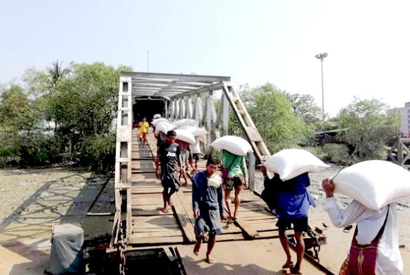 Loading and unloading of rice being take place in Wadan jetty in Yangon