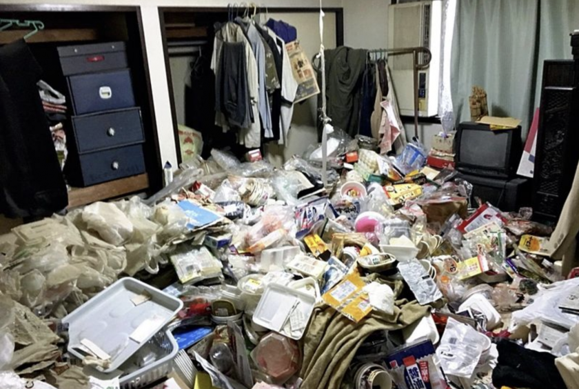A trash-filled room in an apartment of a man in his 50s is seen in this photo./Courtesy of Mago No Te