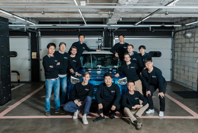 Lee Han-bin (second from left in second row), co-founder of South Korean lidar solutions startup Seoul Robotics, poses with his colleagues. (Seoul Robotics)