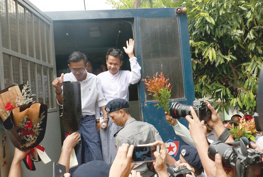 Three senior journalists including the chief editor of Weekly Eleven were brought to the trial on October 18. (Photo-EMG)