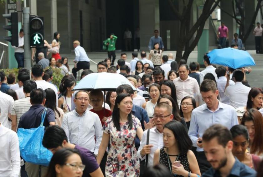 Pedestrians in the Central Business District, on Nov 4, 2019. Singapore's economic growth for the full year is projected to be between 0.5 per cent and 1 per cent.ST PHOTO: ONG WEE JIN