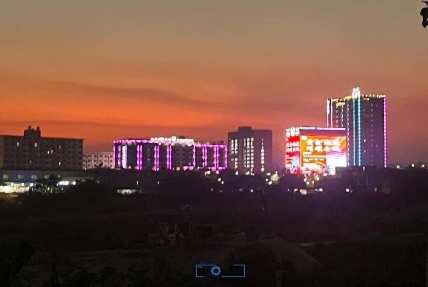 Photo The buildings in Shwe Kokko as seen from the Thai side. (Photo - The Reporter)(Photo‐The Reporter)