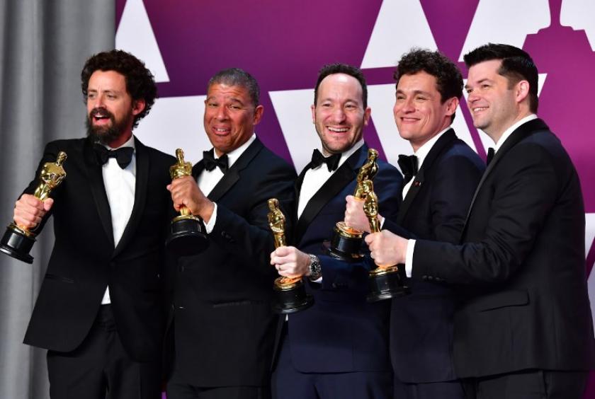 Best Animated Feature Film winners for 'Spider-Man: Into the Spider-Verse' Bob Persichetti, Peter Ramsey, Rodney Rothman, Phil Lord and Christopher Miller poses in the press room with their Oscars during the 91st Annual Academy Awards at the Dolby Theatre in Hollywood, California on February 24, 2019. (AFP/Frederic J. Brown)