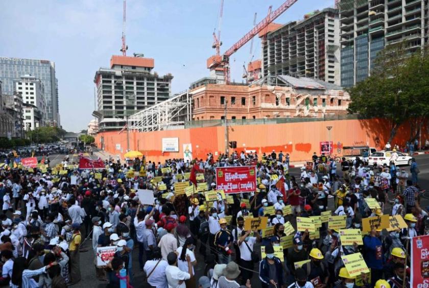 Myanmar's railway staff members take part in a protest against the military coup in Yangon on Feb 19, 2021.PHOTO: AFP