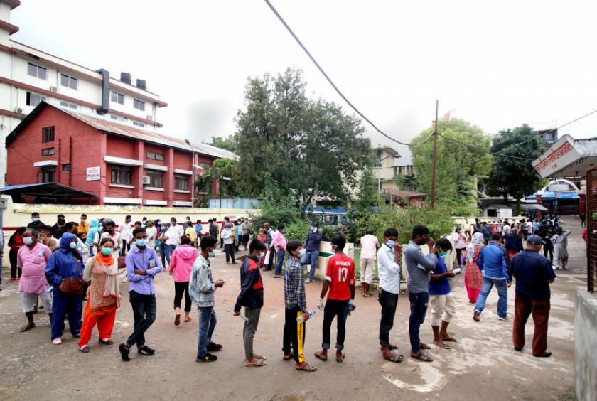People queue at Sukraraj Tropical and Infectious Disease Hopsital for Covid-19 test.  Beeju Maharjan/TKP