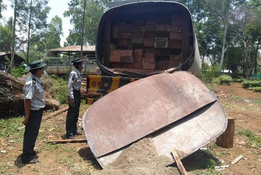 Authorities inspect seized illegal timbers 