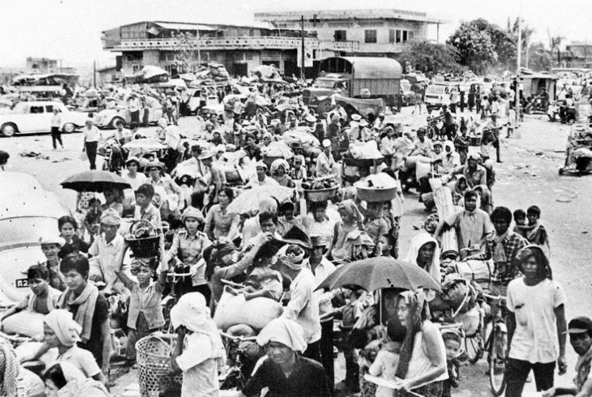 Phnom Penh residents, carrying their worldly possessions, are evacuated by the Khmer Rouge in April 1975. They were told they would be away from the city for three days to avoid a US bombing campaign but they didn’t return for three years. AFP/AKP