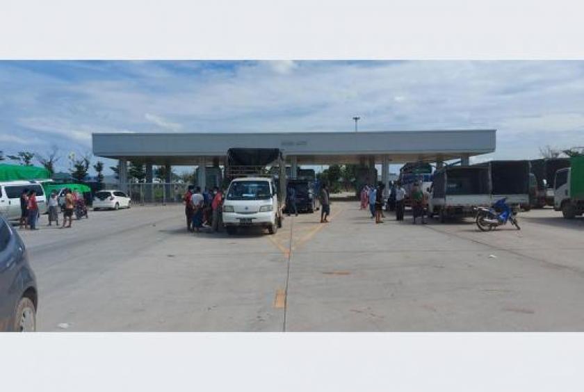 Some cargo trucks waiting to load and unload goods in BCF Zone cargo compound 