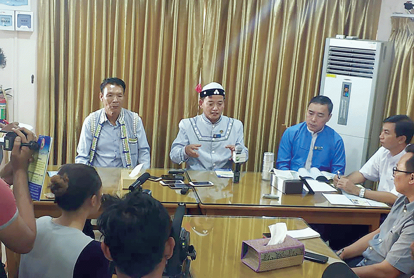 MP J Yaw Wu (center) from the National Unity Party holds a press meet. 
