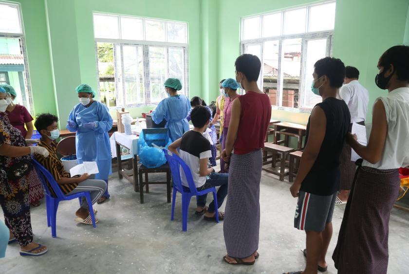 Students receiving Covid jabs in South Oakkalapa Township, Yangon. (Photo-Aung Myo Thant