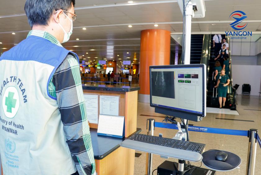 Health authorities screening passengers arriving at Yangon International Airport 