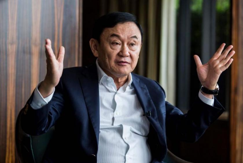 Former Thailand prime minister Thaksin Shinawatra said that he was not sure the new government would be stable and sustainable for a full term.PHOTO: AFP