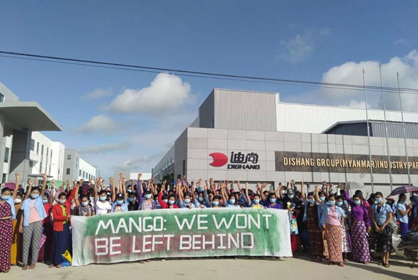 Workers protest in front of Dihuali Garment Factory on July 30
