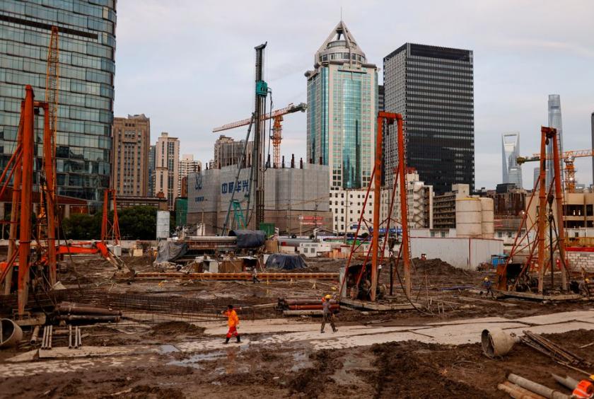 Labourers at a construction site in Shanghai, China. Picture taken July 12, 2021. REUTERS/Aly Song