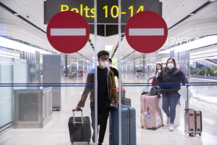 In line with stiffer border controls to help stop the spread of the coronavirus, travellers entering Singapore, regardless of where they come from, are given a 14-day stay-home notice.PHOTO: EPA-EFE