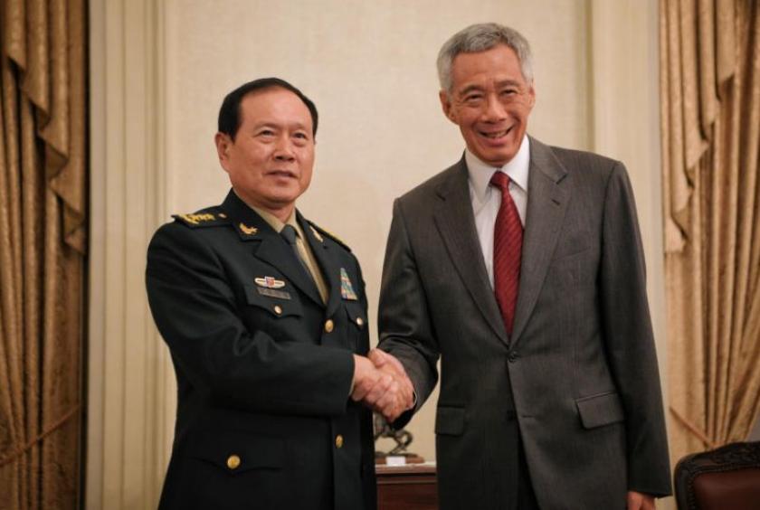 Chinese Defence Minister Wei Fenghe calls on Prime Minister Lee Hsien Loong at the Istana on May 30, 2019.ST PHOTO: MARK CHEONG