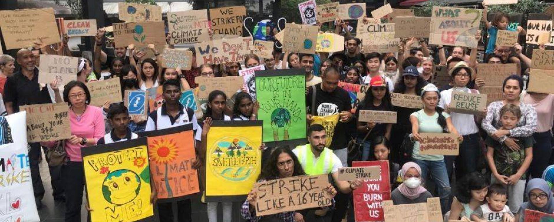 students, children and civil society members marching to raise awareness for action against Climate Change---Climate Action Now Pakistan's Twitter Account