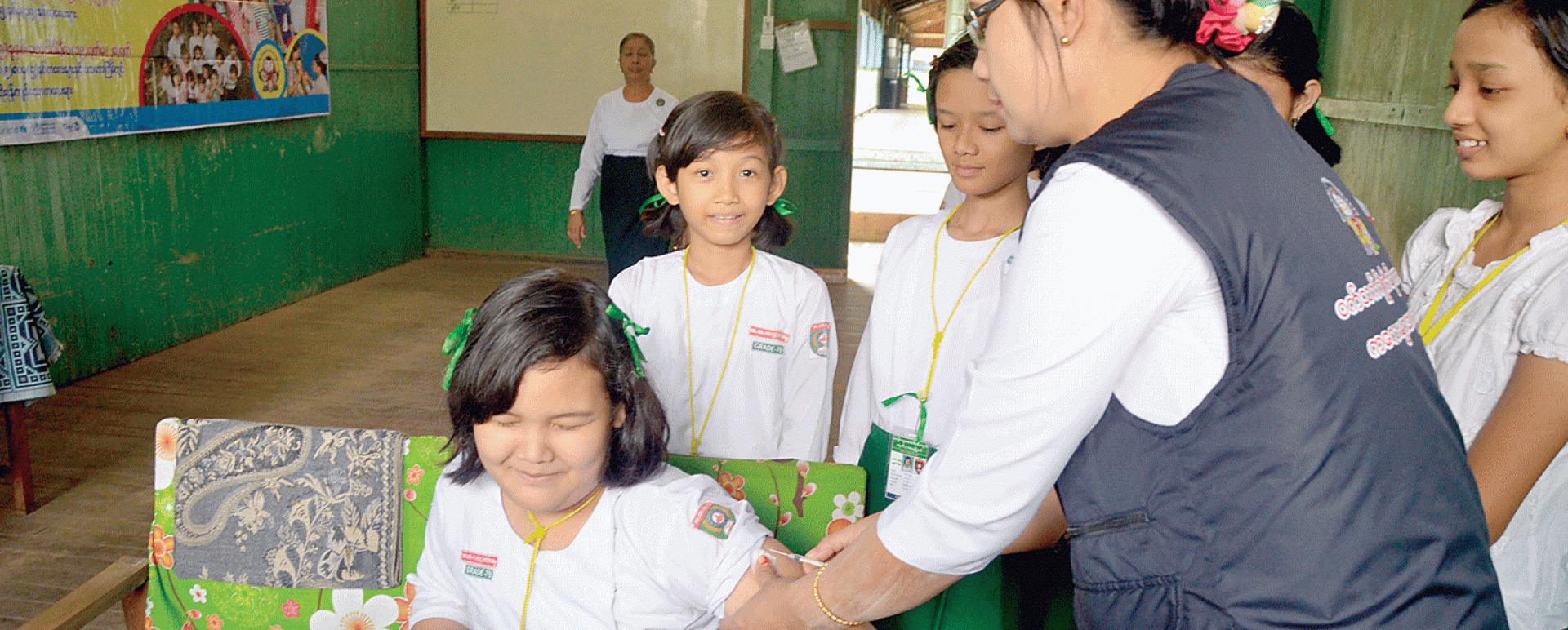 Health department vaccinated against measles and rubella at a school in 2015 (photo-Kyi Naing)