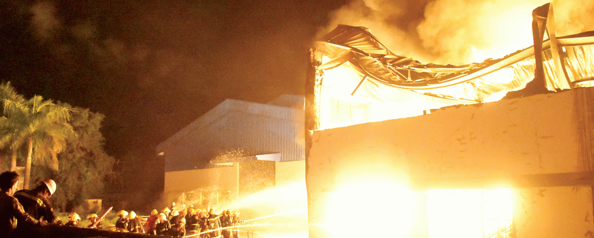 Fireman puts out a fire at Petroleum Product Warehouse in Industrial Zone-1 in Dagon Seikkan Township (Photo-Myo Htet Paing)