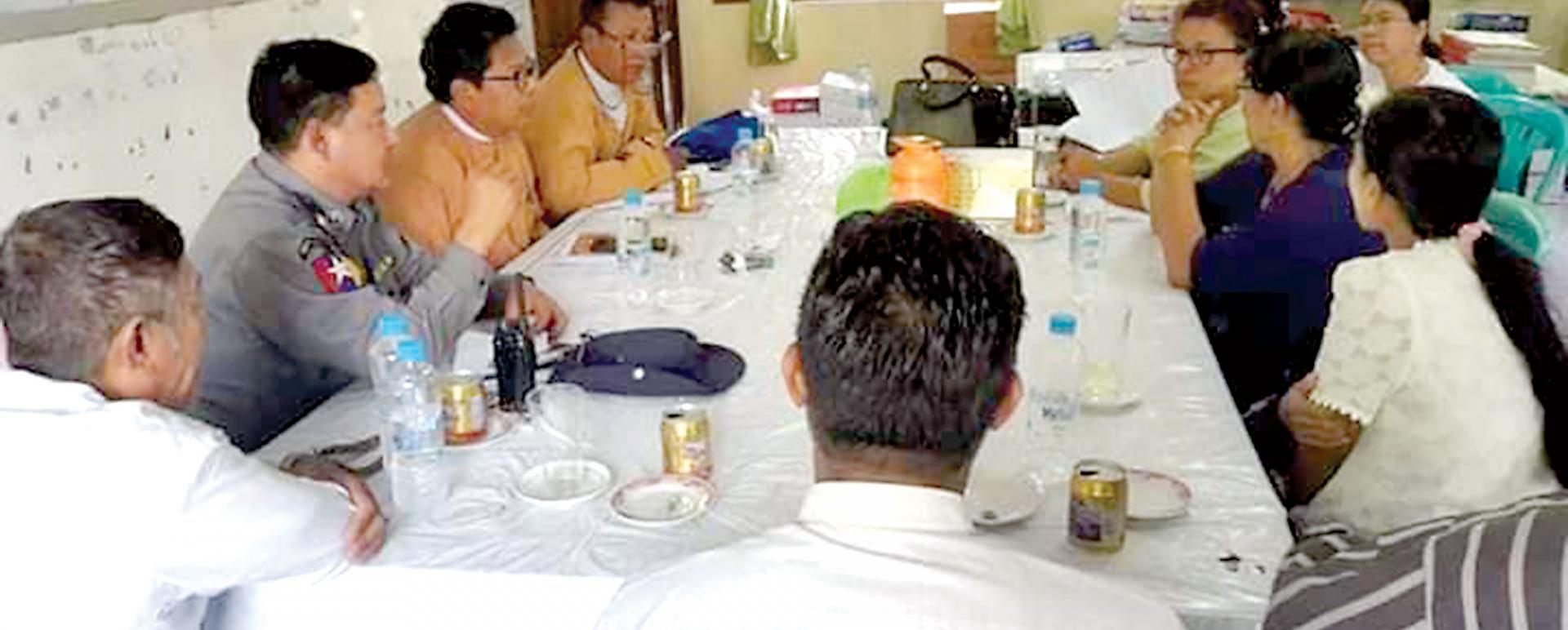 MP Nyi Nyi discuss the seizure of devices for methamphetamine consumption with authorities.