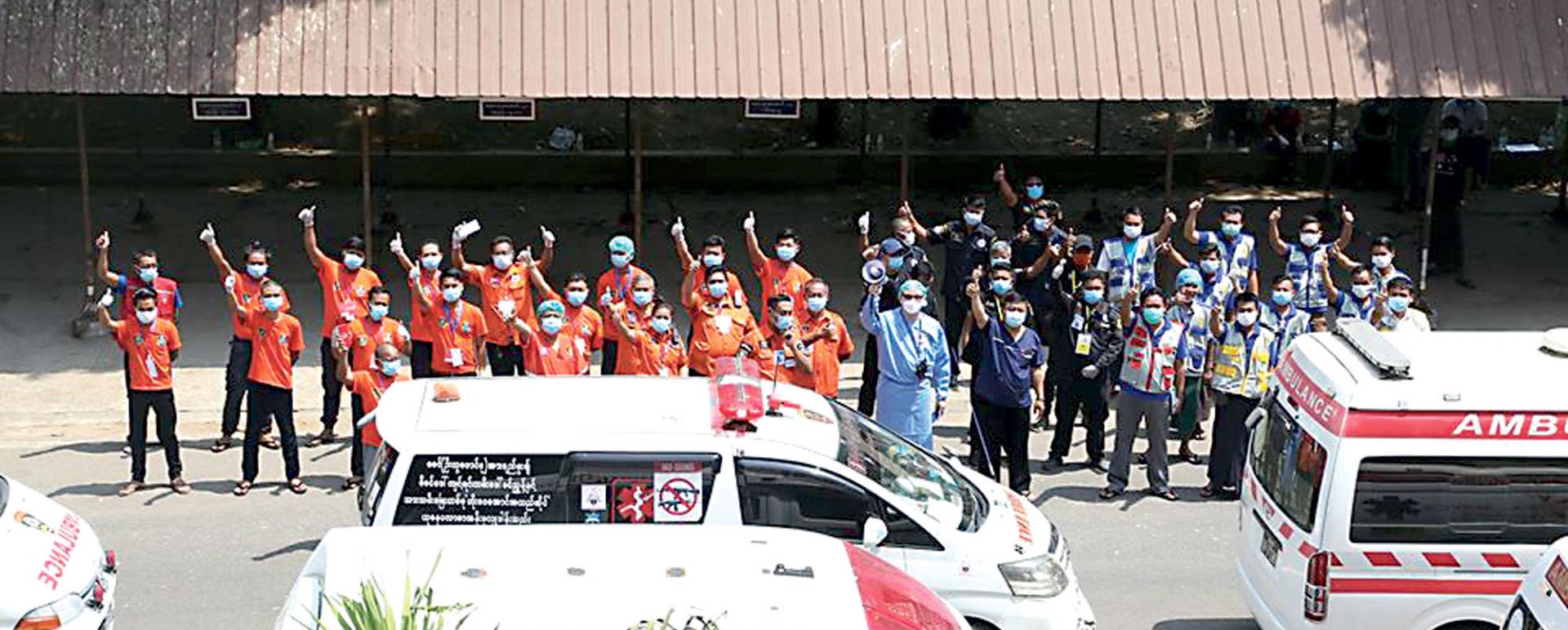 Ambulance drivers seen in the compound of Yangon General Hospital