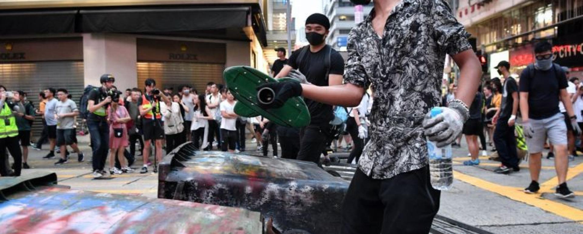 Protesters set up a makeshift roadblock with rubbish bins in Mong Kok, Hong Kong, on Oct 13, 2019.ST PHOTO: CHONG JUN LIANG