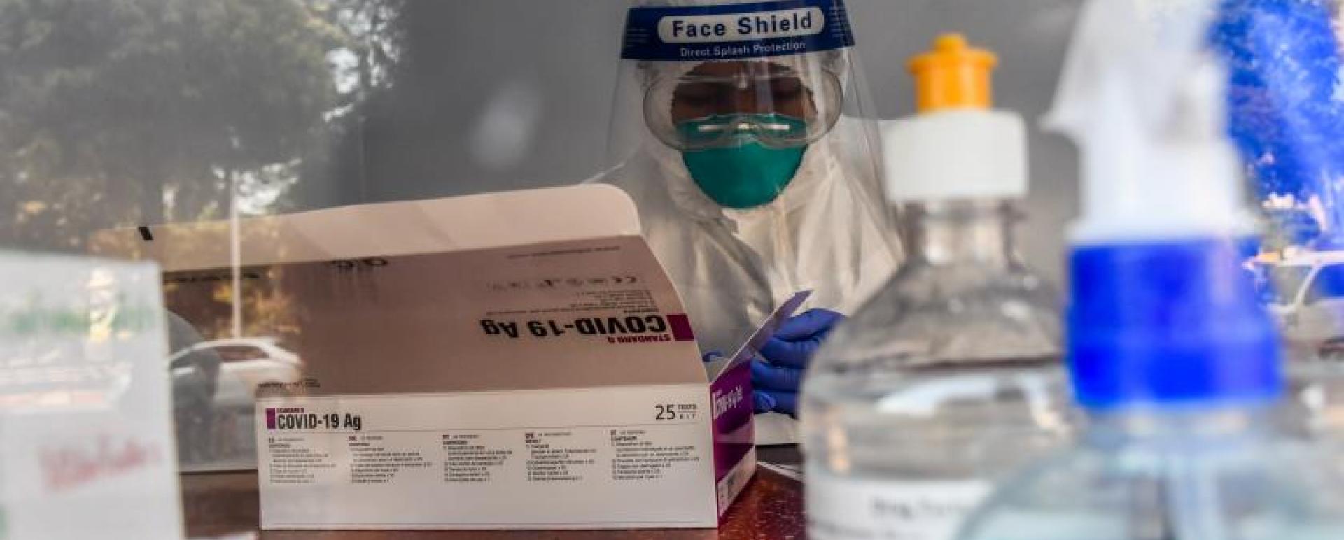 A medical staff is seen at the laboratory (Photo-Kyi Naing)