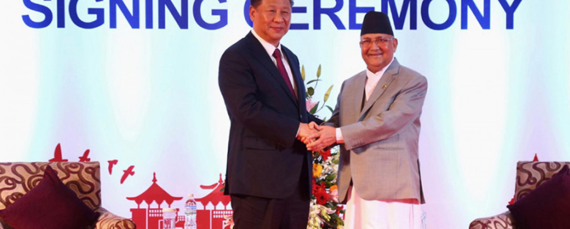 Chinese President Xi Jinping (left) and Prime Minister KP Sharma Oli shake hands after signing the agreements in Kathmandu on Sunday. RSS