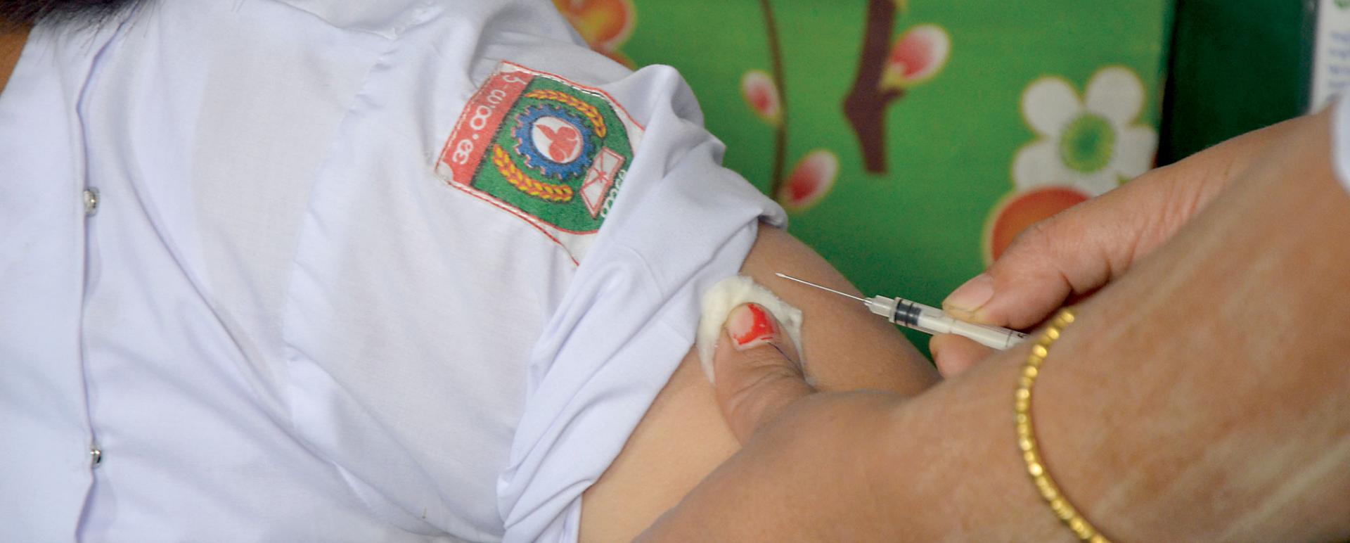 A child was vaccinated against measles (Photo-Kyi Naing)