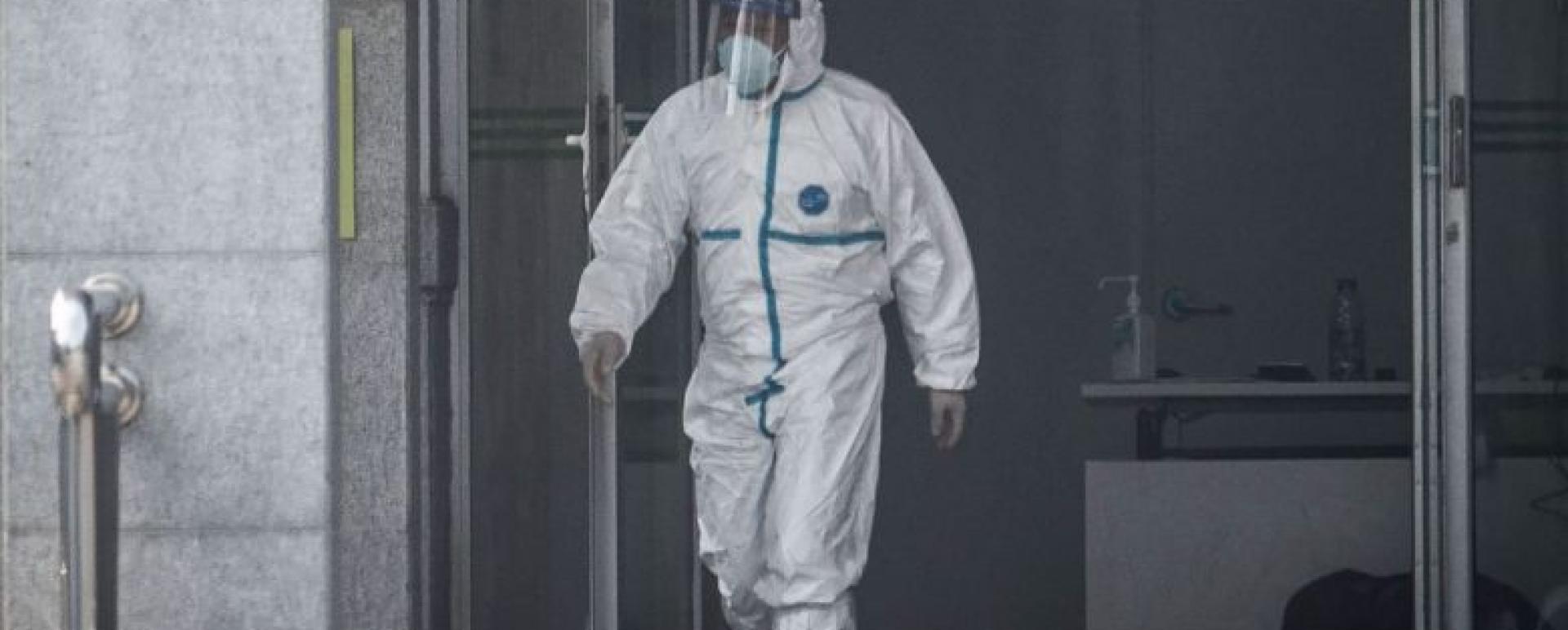A medical staff member walks outside the Jinyintan hospital, where patients infected by a mysterious Sars-like virus are being treated, in Wuhan on Jan 18, 2020.PHOTO: AFP