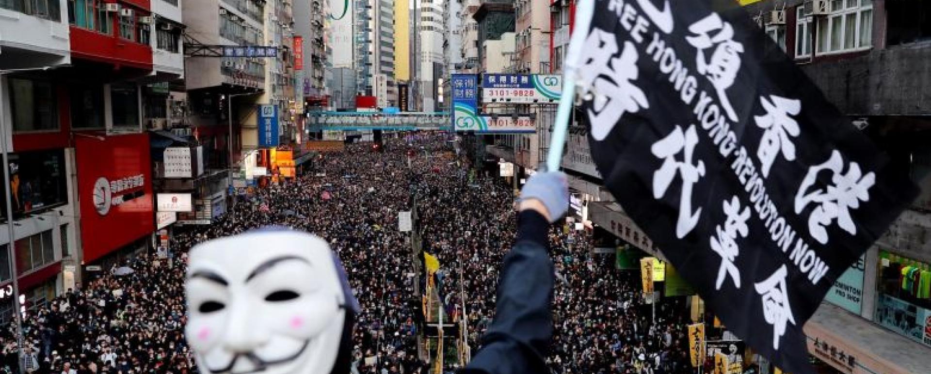 People marching in Hong Kong on Dec 8, 2019. The rally went smoothly but tensions notched up at night when hundreds of protesters in face masks and helmets started building barricades in areas such as Central and Causeway Bay to slow down riot police stationed metres away.PHOTO: REUTERS