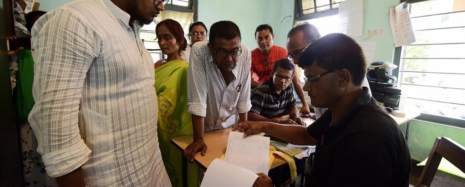 People get their names checked on the draft list at a National Register of Citizens (NRC) Centre in Nagaon. (File Photo: IANS) 