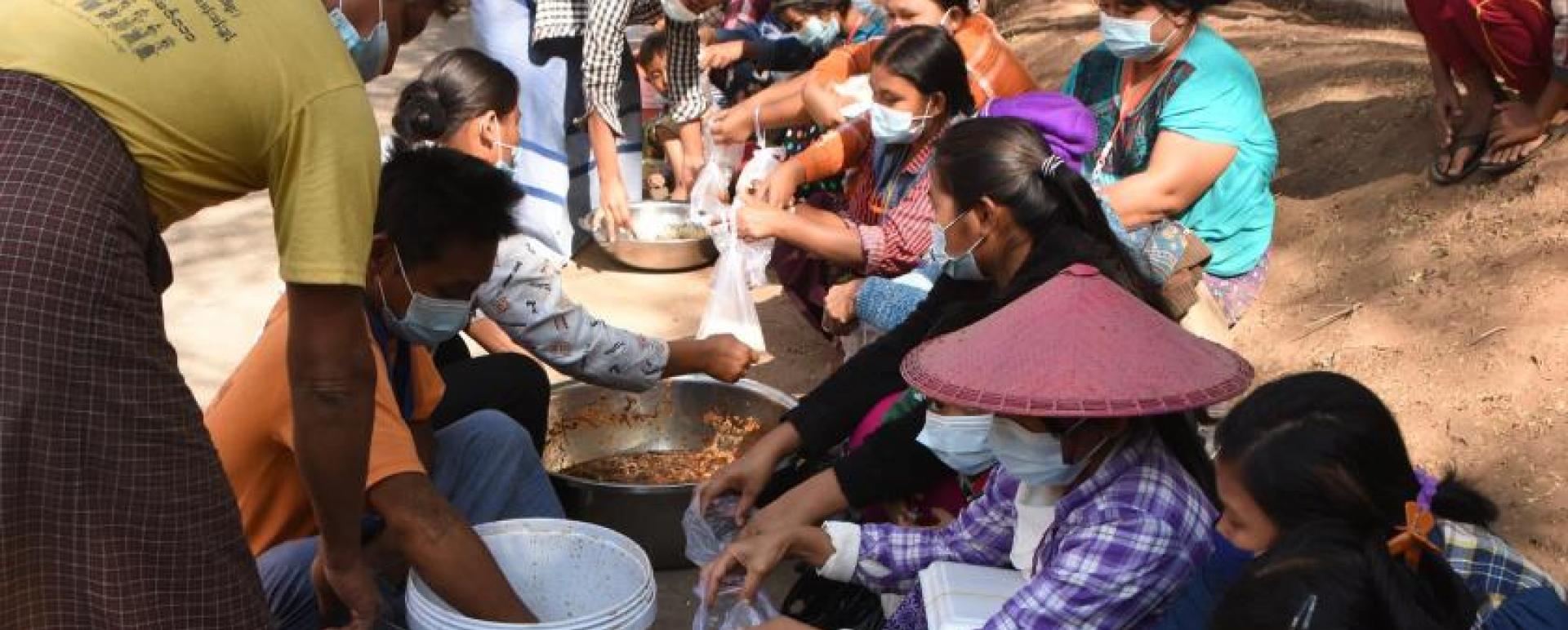 The grassroots are queuing up for the meals from the monastery (Photo-Min Thant)