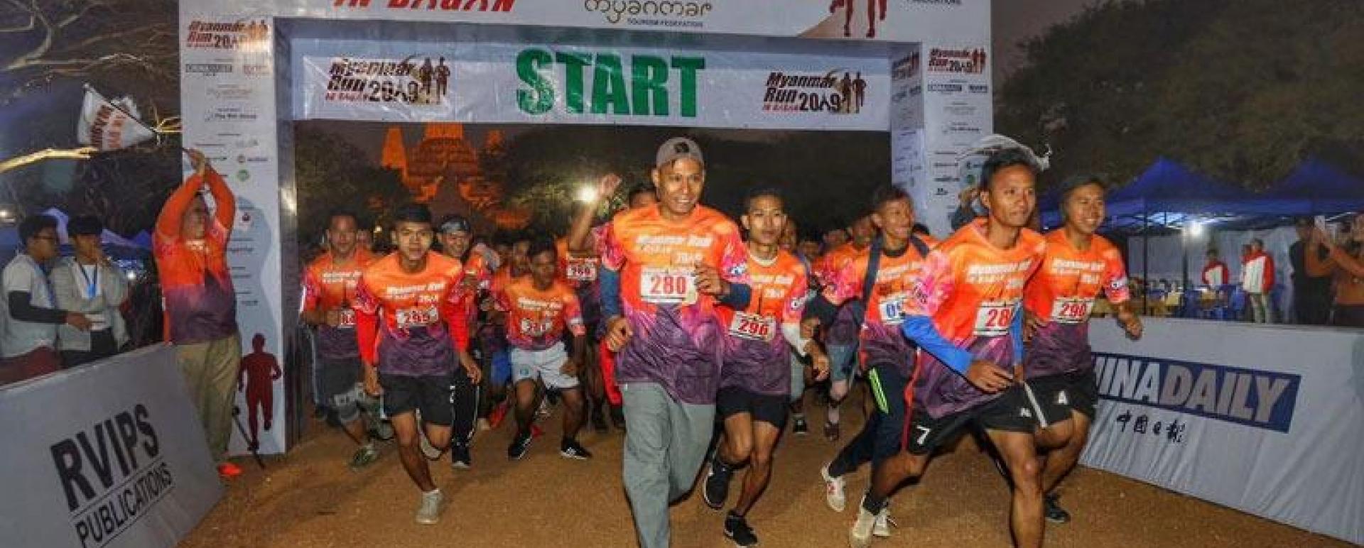 Participants start from the start line at Ananda Pagoda in full gear, in the Myanmar Run held in Bagan, Myanmar, Dec 15, 2019. (EDMOND TANG/CHINA DAILY)