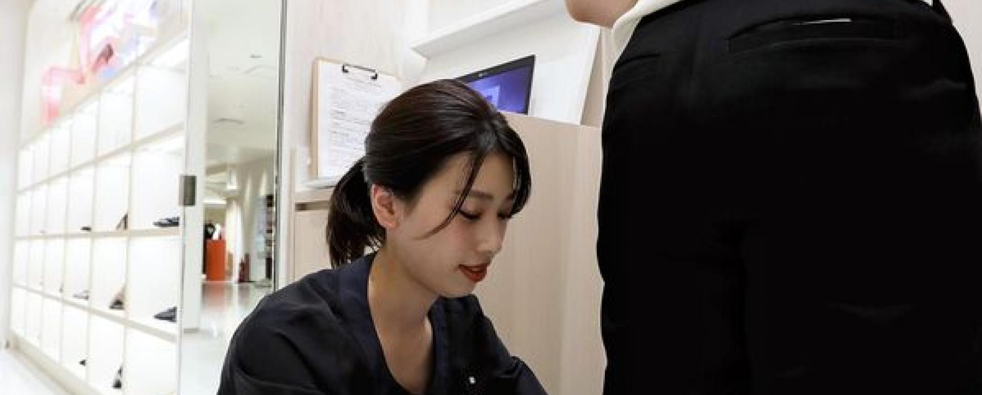 A customer has her feet scanned with a 3D machine at the Isetan Shinjuku department store in Shinjuku Ward, Tokyo.