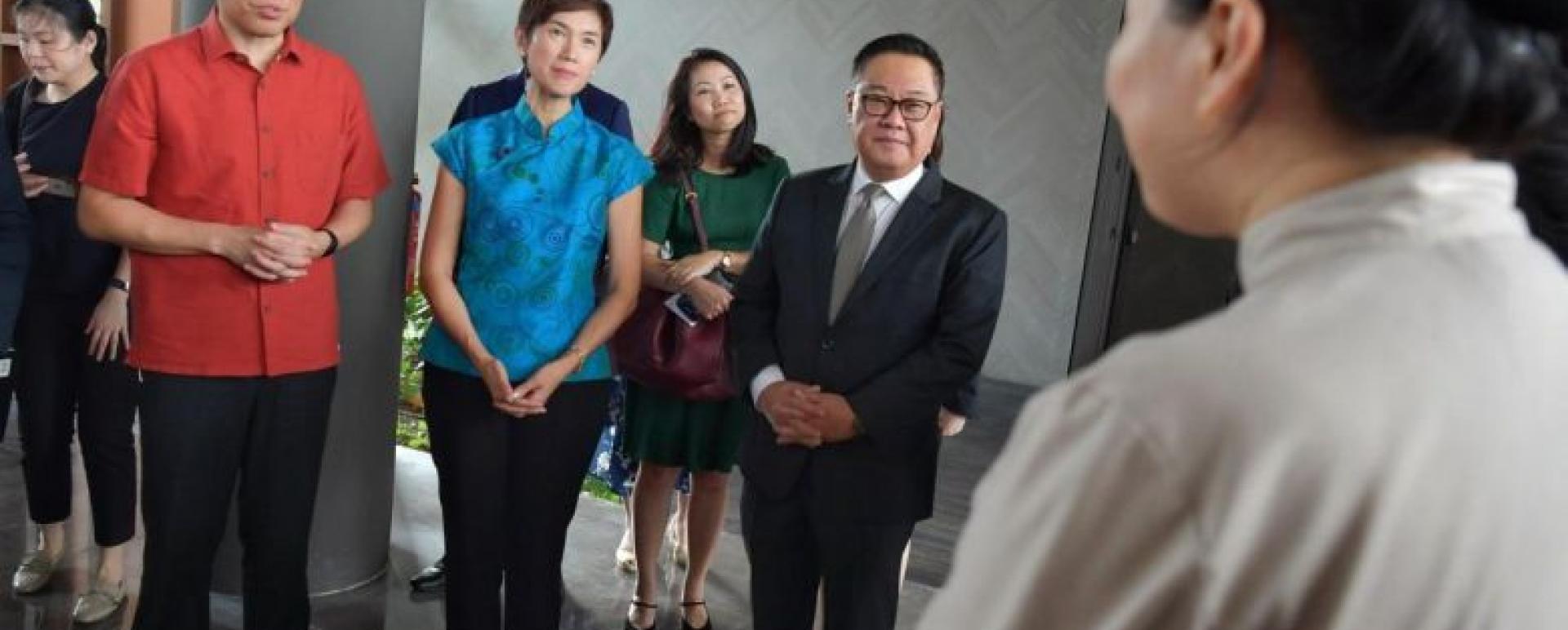 (From left) Minister for Trade and Industry Chan Chun Sing, Minister for Manpower Josephine Teo alongside Far East Hospitality CEO Arthur Kiong (fifth from left) during a visit to Oasia Hotel Downtown on Feb 2, 2020.ST PHOTO: NG SOR LUAN