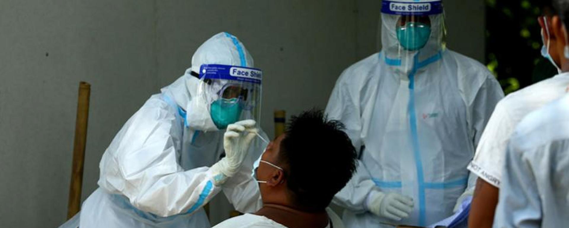 Swab tests being taken from highway drivers and helpers leaving Yangon Region (Photo-Myo Htet Paing)